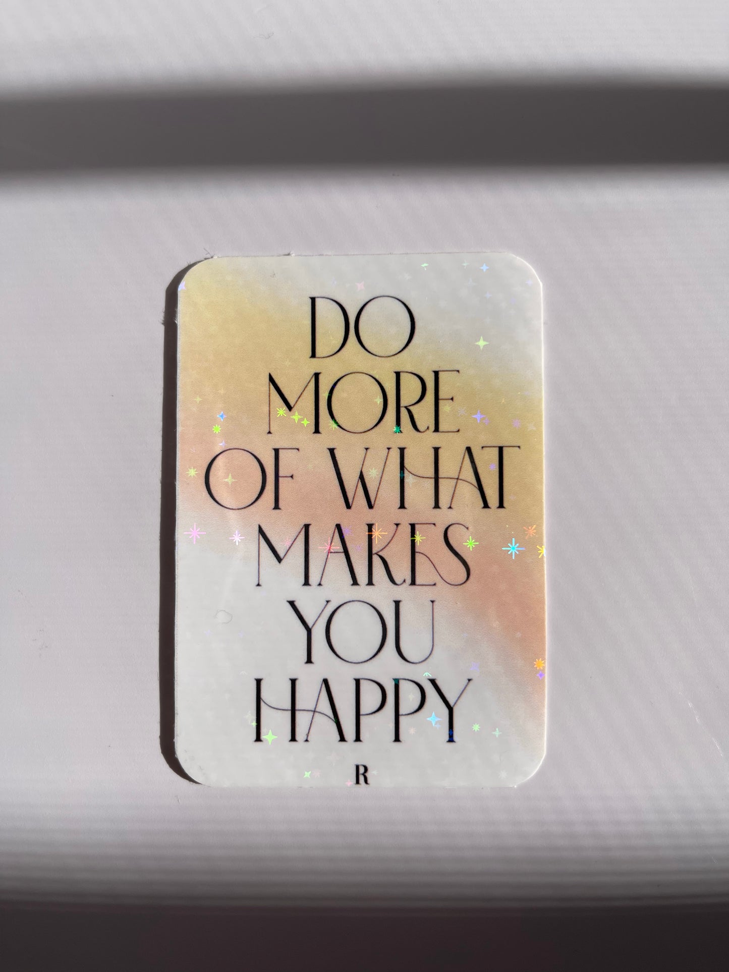 Do more of what makes you happy sticker holographic